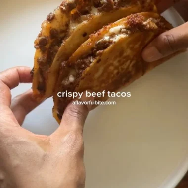 Delicious crispy ground beef tacos served with fresh toppings