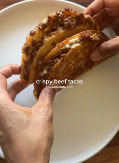 Delicious crispy ground beef tacos served with fresh toppings