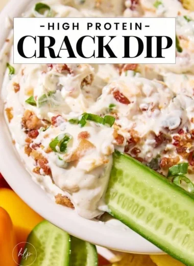 High Protein Crack Dip served in a bowl with crackers on the side