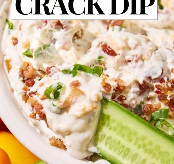 High Protein Crack Dip served in a bowl with crackers on the side