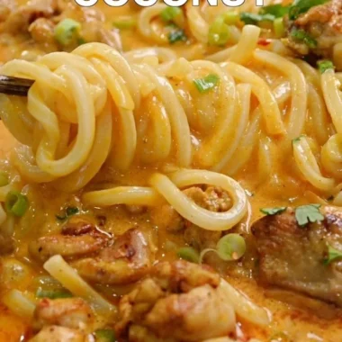 Delicious Thai-inspired coconut red curry chicken served over udon noodles