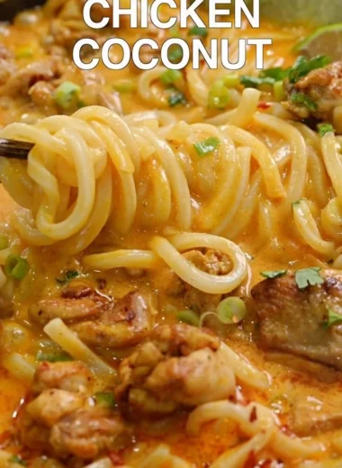 Delicious Thai-inspired coconut red curry chicken served over udon noodles