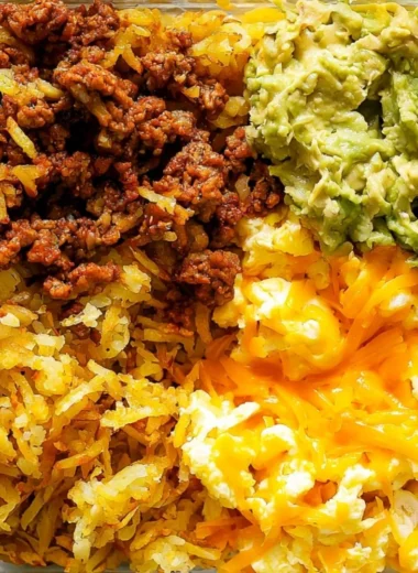 Healthy breakfast burrito bowl filled with eggs, vegetables, and salsa