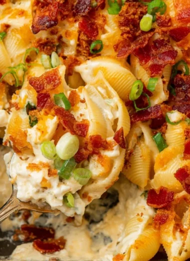 Delicious Chicken Bacon Ranch Casserole topped with crispy bacon and ranch seasoning