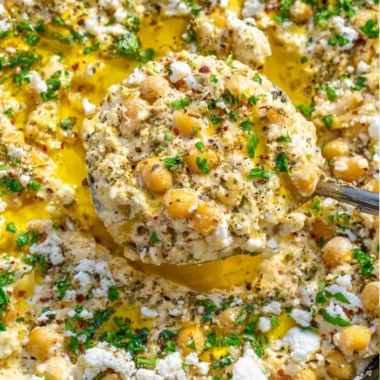 A vibrant Chickpea Lemon Skillet with vegetables and spices in a cast iron pan.