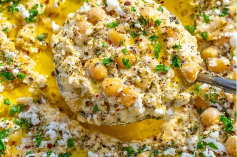 A vibrant Chickpea Lemon Skillet with vegetables and spices in a cast iron pan.