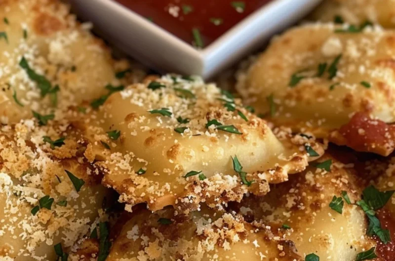 Golden crispy air fryer ravioli on a plate ready to be served