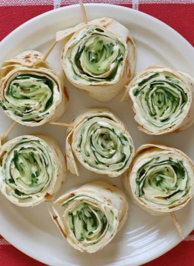 Delicious Cucumber Wrap Sandwiches filled with fresh vegetables and herbs.