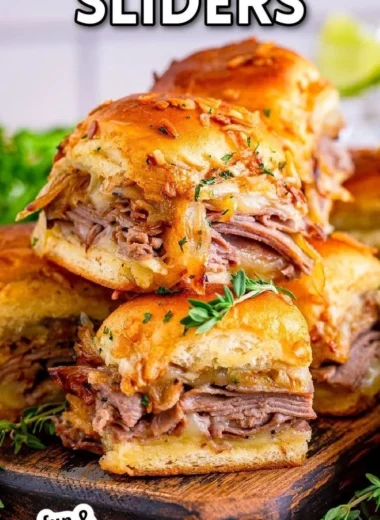 Delicious French Dip Sliders served with rich dipping sauce