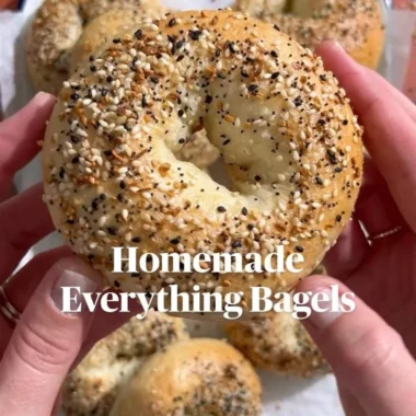 Freshly baked homemade everything bagels topped with seeds and seasonings.