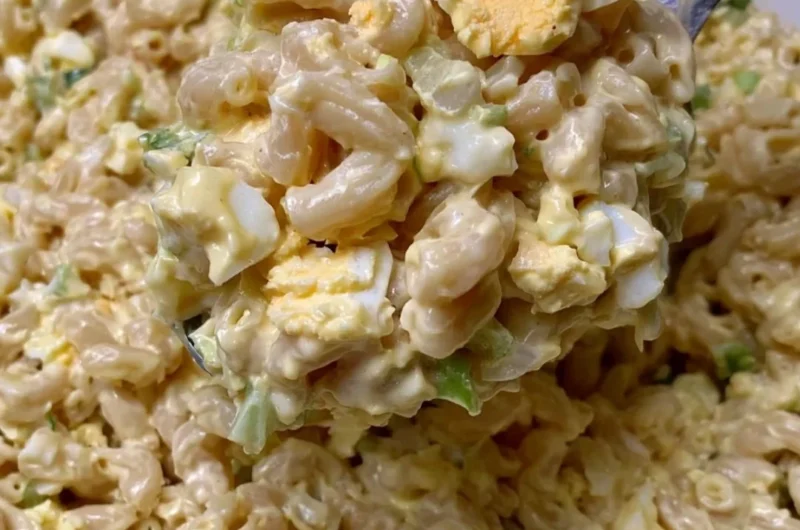 Delicious Mom's Macaroni Salad served in a bowl with colorful vegetables