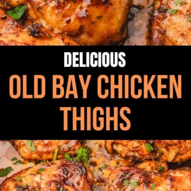 Juicy Old Bay Chicken Thighs garnished with fresh herbs on a plate.