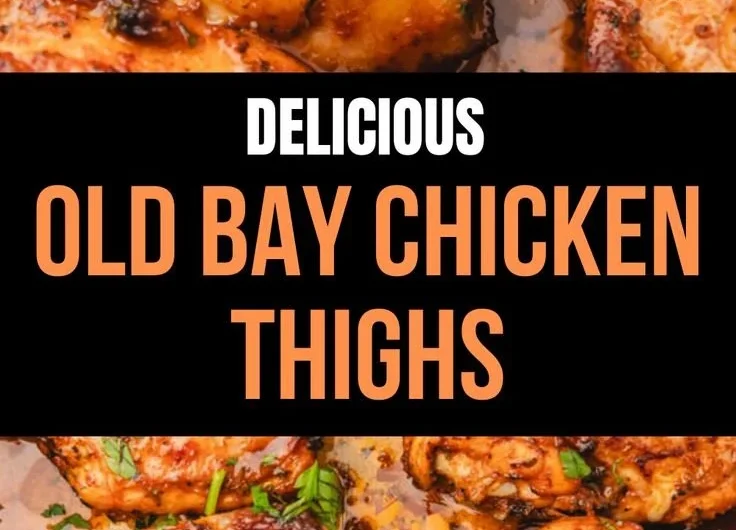 Juicy Old Bay Chicken Thighs garnished with fresh herbs on a plate.