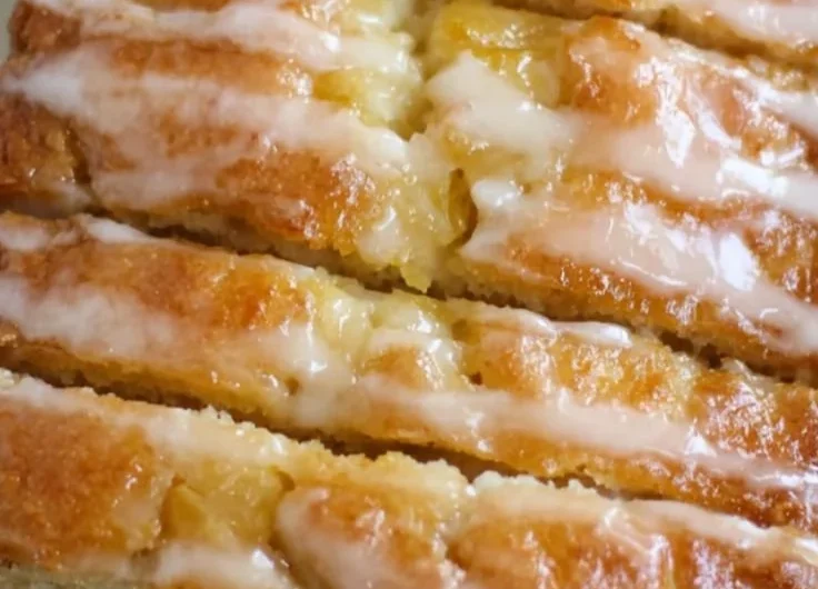 Freshly baked pineapple bread with a golden crust and tropical flavor