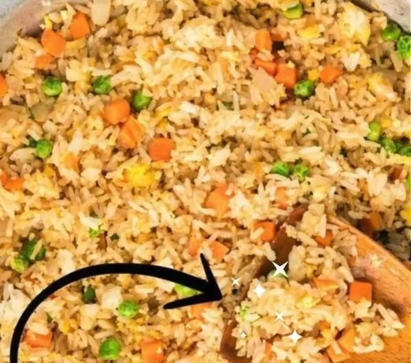 Plate of quick and easy fried rice with vegetables and egg