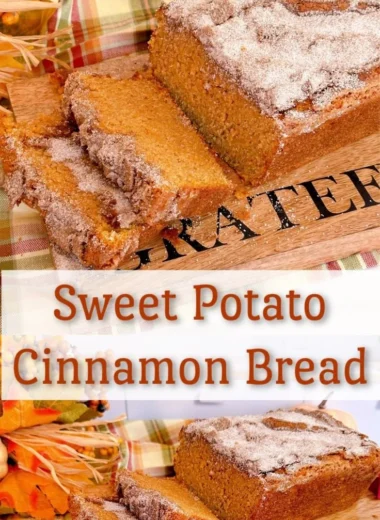 A loaf of freshly baked Sweet Potato Bread sliced and served with butter.