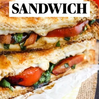 Toasted Caprese Sandwich with fresh mozzarella, tomatoes, and basil on toasted bread.