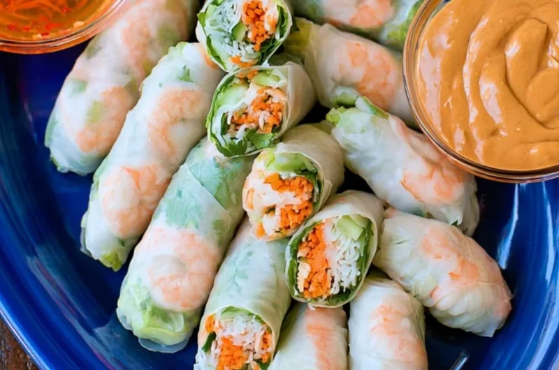 Freshly made Vietnamese Spring Rolls with colorful vegetables and herbs