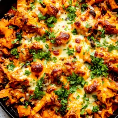 Butternut squash and black bean enchilada skillet topped with fresh cilantro