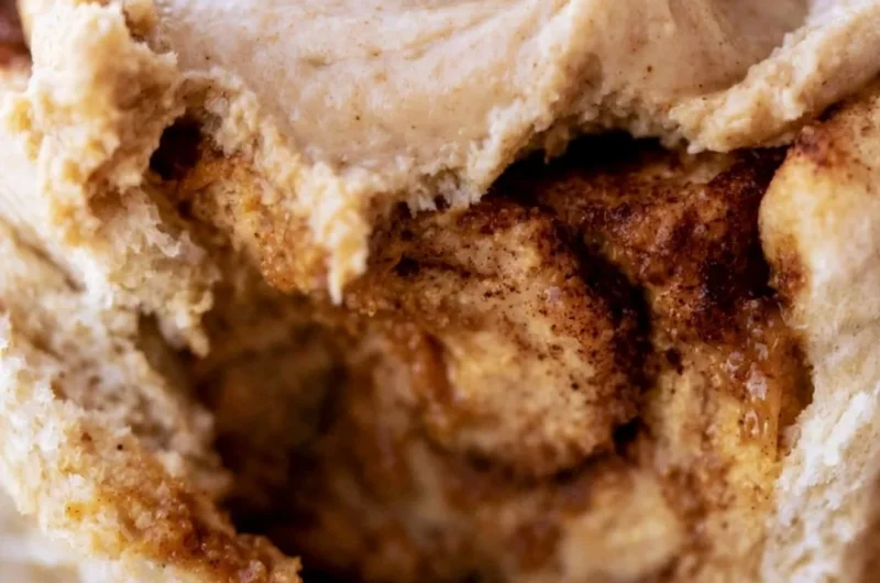 Delicious pumpkin cinnamon rolls drizzled with buttery frosting