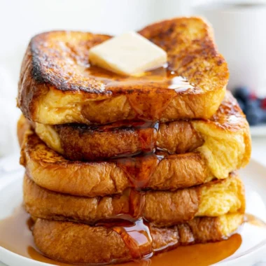 Delicious plate of easy French toast with syrup and fresh berries for breakfast