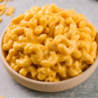 Delicious homemade mac and cheese served with a golden, cheesy topping