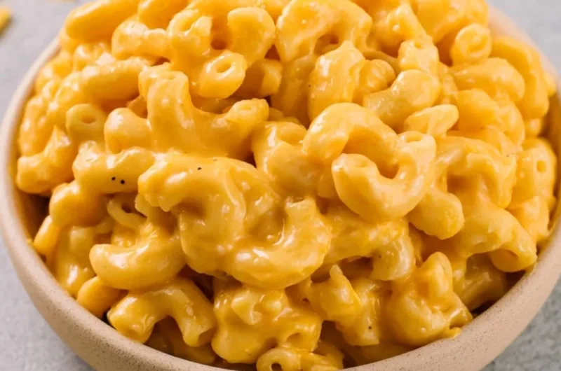 Delicious homemade mac and cheese served with a golden, cheesy topping
