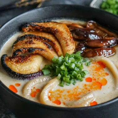 Bowl of Miso Udon Soup with Teriyaki Mushrooms and garnishes