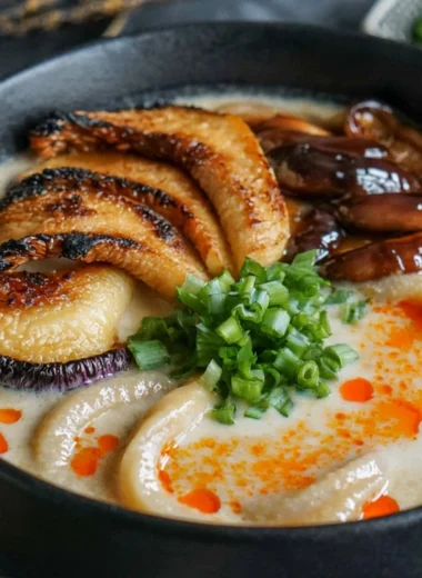 Bowl of Miso Udon Soup with Teriyaki Mushrooms and garnishes