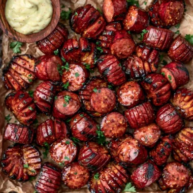 Mustard Hasselback Kielbasa Bites served on a platter
