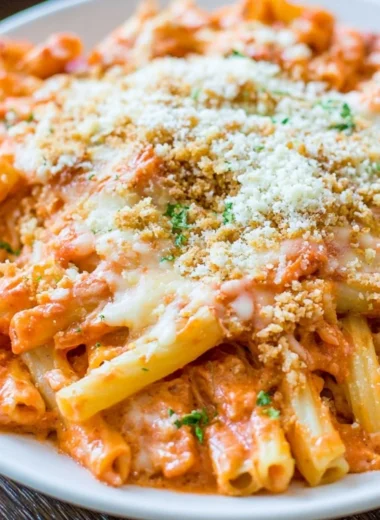 Delicious Olive Garden Five Cheese Ziti Al Forno plated with melted cheese on top